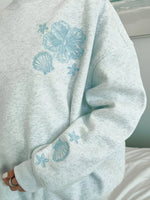 Elinora | Dames Crewneck Sweater met Tropische Parels – Casual Luxe Detail